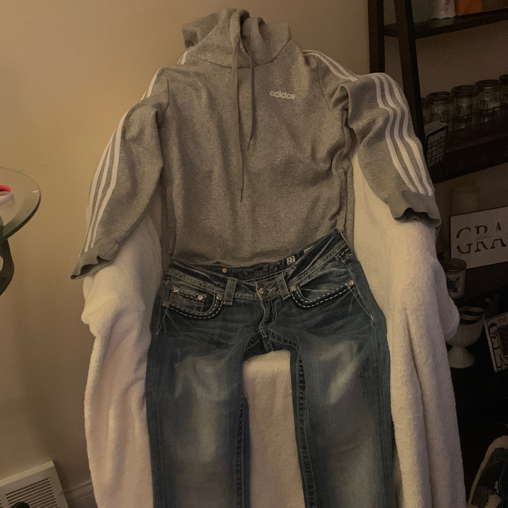 Adidas Gray Hoodie with Miss Me jeans makes for one go to look.